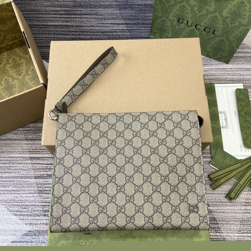 G*u*i clutch bags
